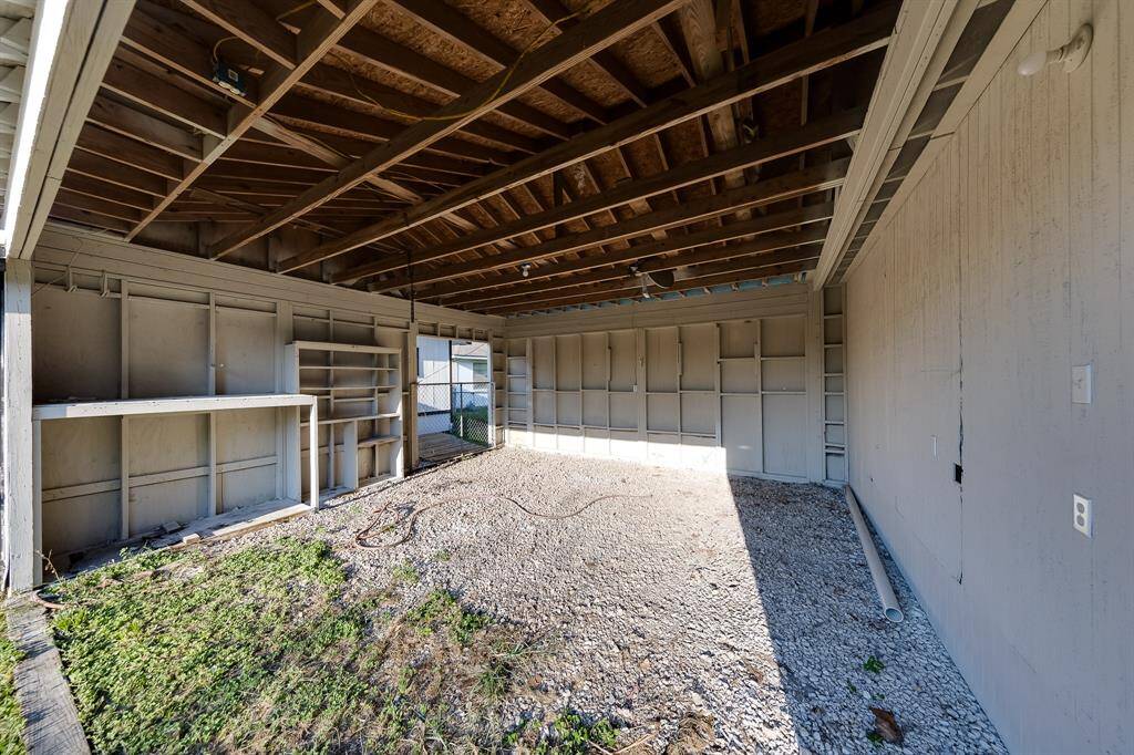 The garage space offers ample room for parking and storage, making it a practical addition to the home. With enough space to accommodate vehicles, tools, and outdoor equipment, it provides a convenient solution for keeping everything organized and easily accessible.