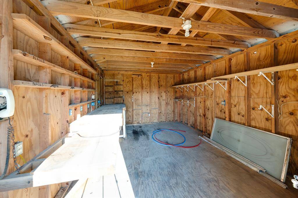 The storage shed offers great potential for organizing tools, gardening supplies, or outdoor equipment. This versatile space can also be transformed into a workshop or hobby area, providing an excellent solution for keeping your outdoor setup tidy and functional.