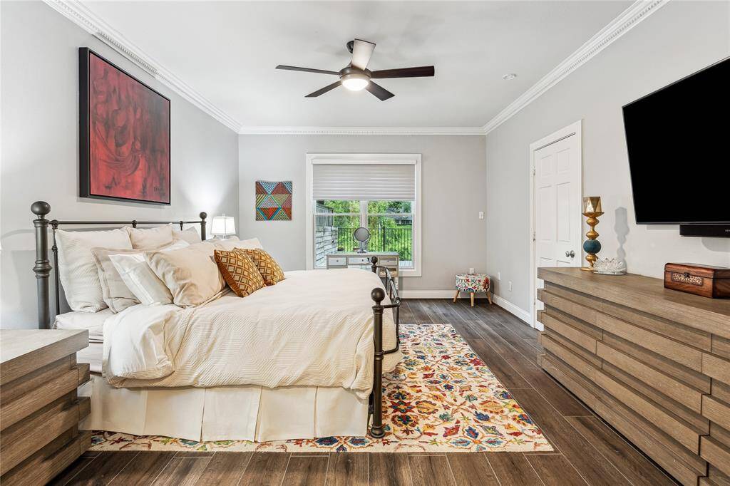 The primary bedroom also offers beautiful views of the bayou.