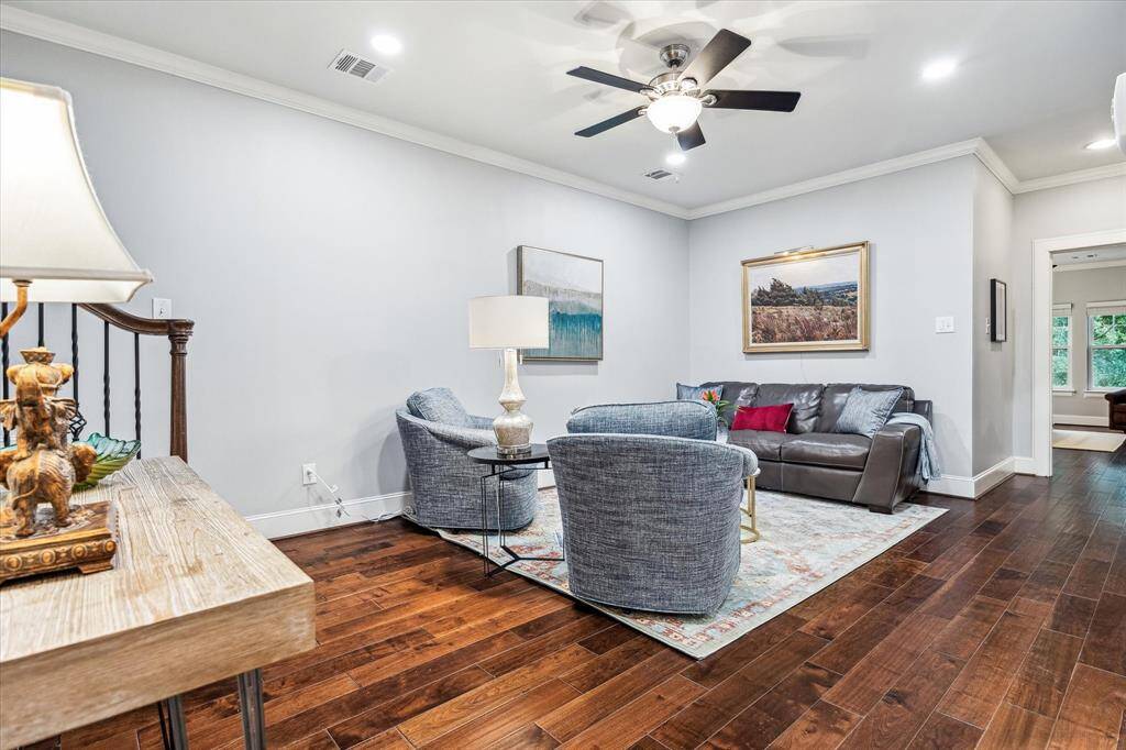 The entire second level was renovated approximately 10 years ago. The ceiling was raised to 10', giving the home the spacious, open feel of a newer construction property. It features a game room, two bedrooms, and two bathrooms, offering plenty of room for entertainment and relaxation.