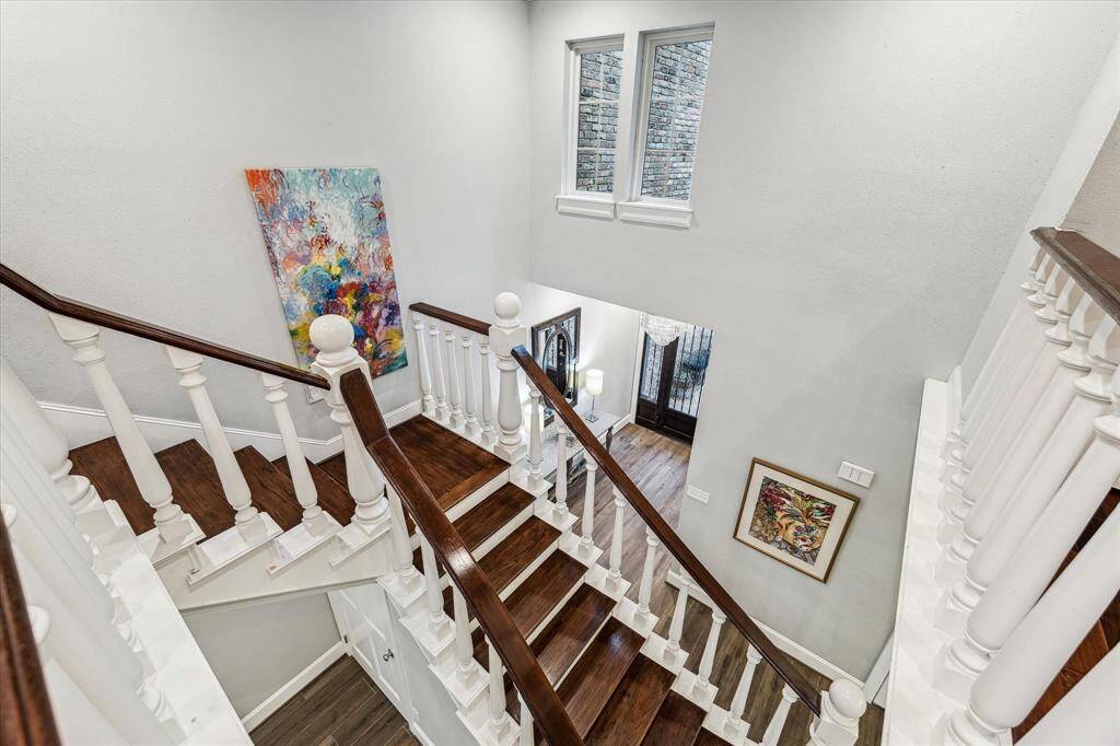 The home boasts a great floor plan, with the second story removed to raise the ceilings to 10', creating a spacious, open feel throughout. A bonus feature is the third-floor finished flex space, adding an additional 396 sq. ft. with AC, perfect for a variety of uses, though not included in the official square footage.