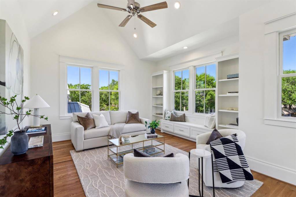 The flex space has a window seat and bookshelves, tons of natural light and a vaulted ceiling.