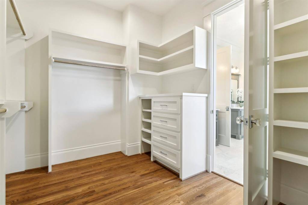 The functional primary closet has lots of space all the things - this is just one view.