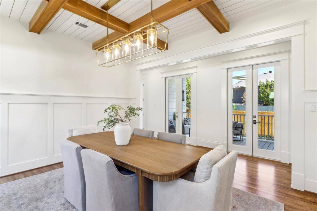 The dining room is just off the main foyer and enjoys a a double set of French doors, a perfect opportunity to open up on a gorgeous Spring evening and dine-semi alfresco after drinks on the porch.