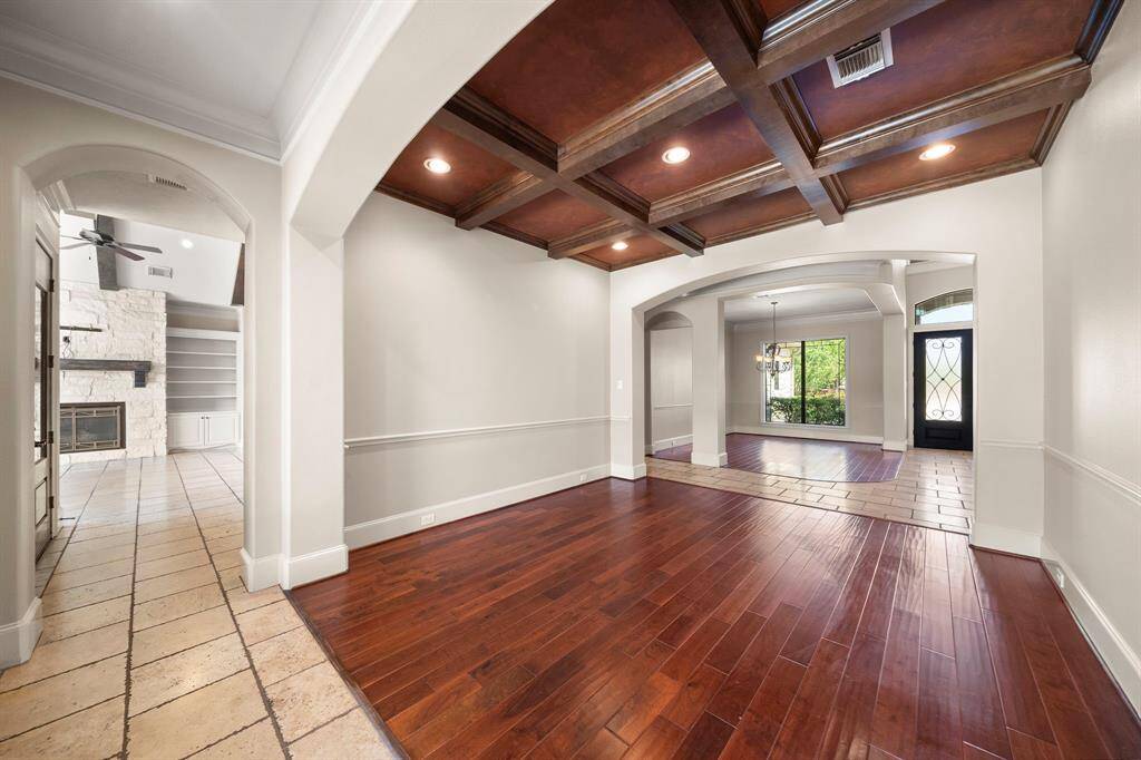 Family room with custom wood coffer ceiling