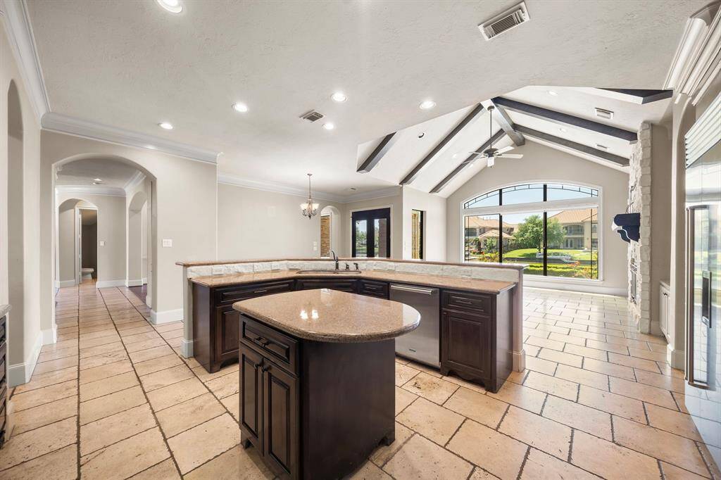 Kitchen open to family room and easy access to dining and outdoor areas