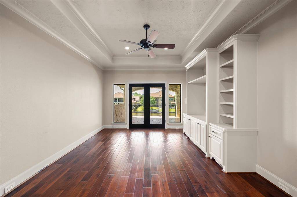 Second floor - Gameroom with access to large covered balcony.