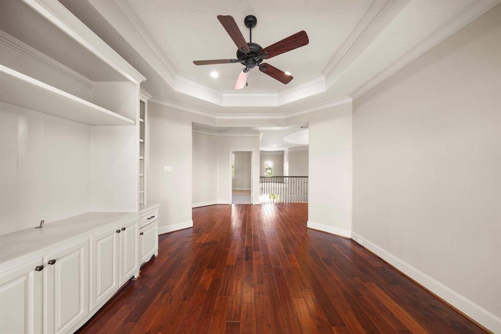 Second floor - Gameroom with ac built-ins and tray celing.