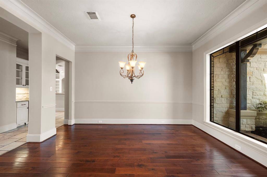 Formal dining with dry bar and large picture window
