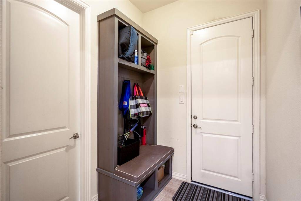 The convenience of a MUD room as you enter the home from the garage allows a convenient drop zone.