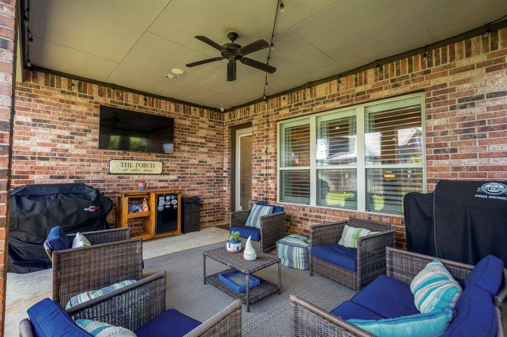 The outdoor covered patio is extremely spacious and offers your family an area to relax and enjoy summer and winter.