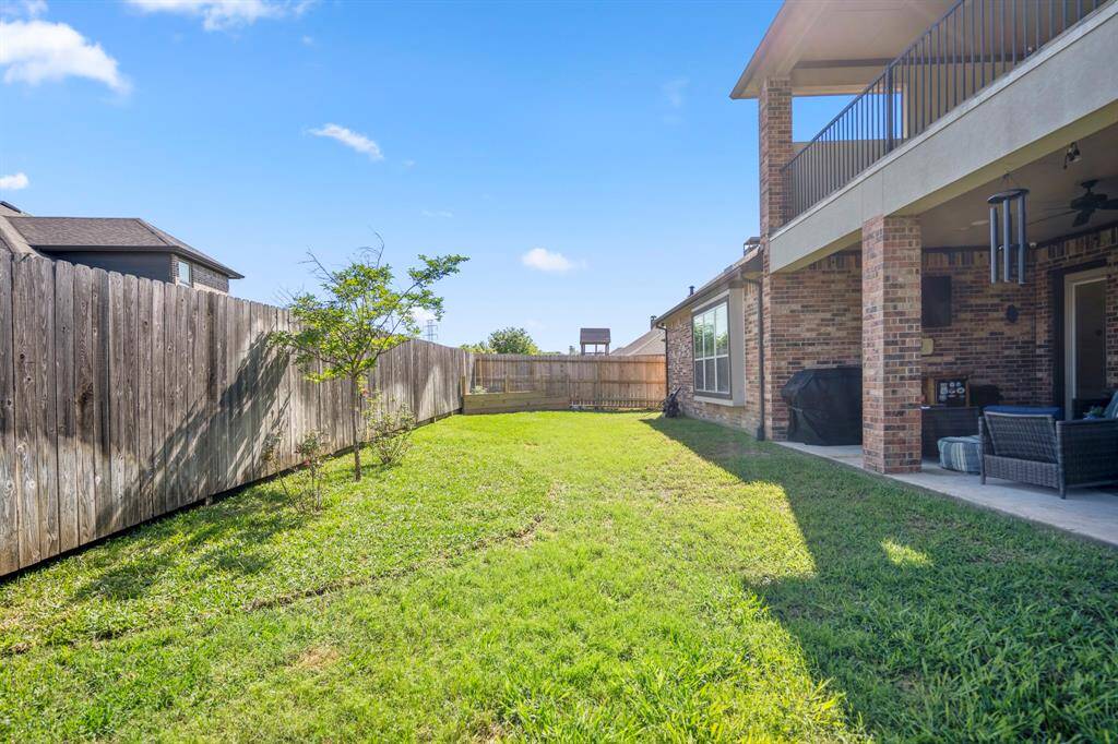 This backyard is waiting for you to come along and enjoy creating a flower or vegetable garden.