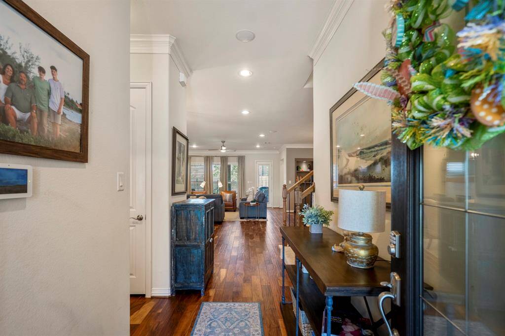 The entry draws visitors comfortably in and provides a pause before one advances toward the living area of the home.
