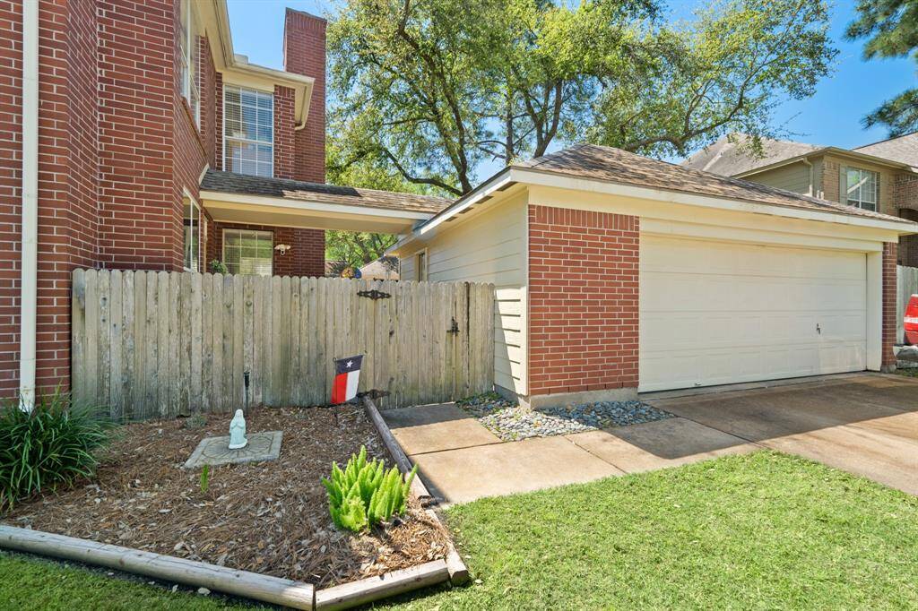 The detached garage is spacious with plenty of storage in addition room for two cars.