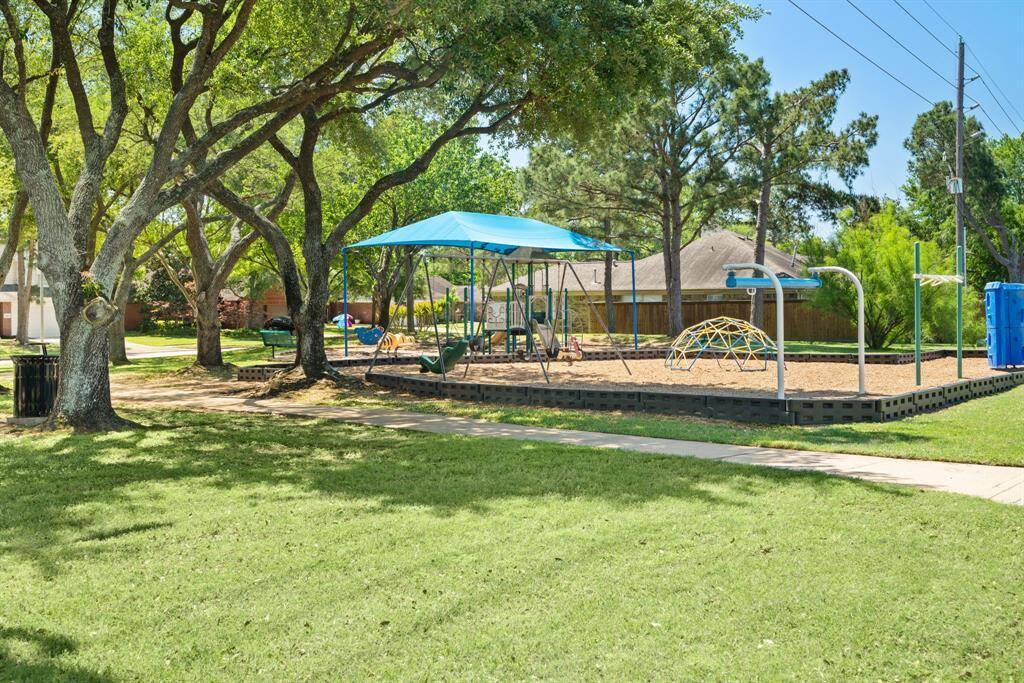 Copperfield Westcreek Village has two pools for residents and this pool/park is an easy walk from the home on Feather Springs.