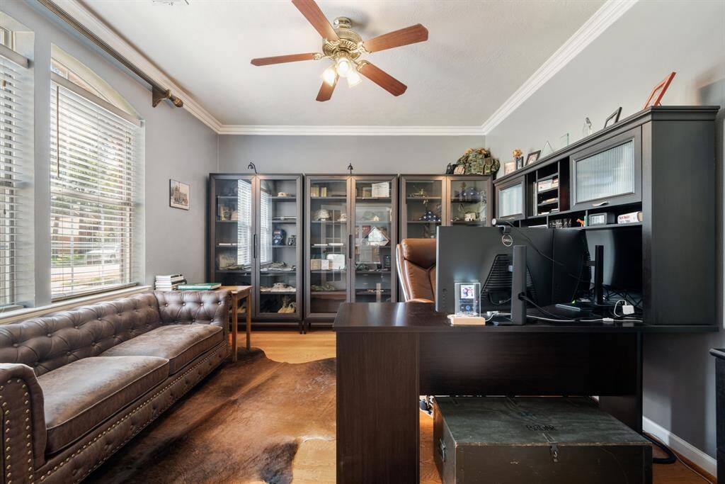 The Study is to the left of the Entry and also features hardwood floors, large windows and crown molding.