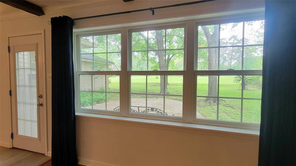 Patio access and views of the golf course from the family room.