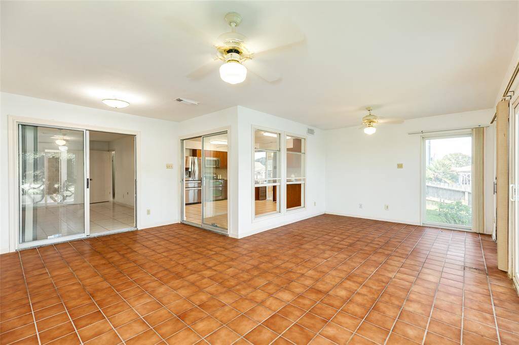 Large sun room that is great for additional space, den, entertainment room, game room and more.