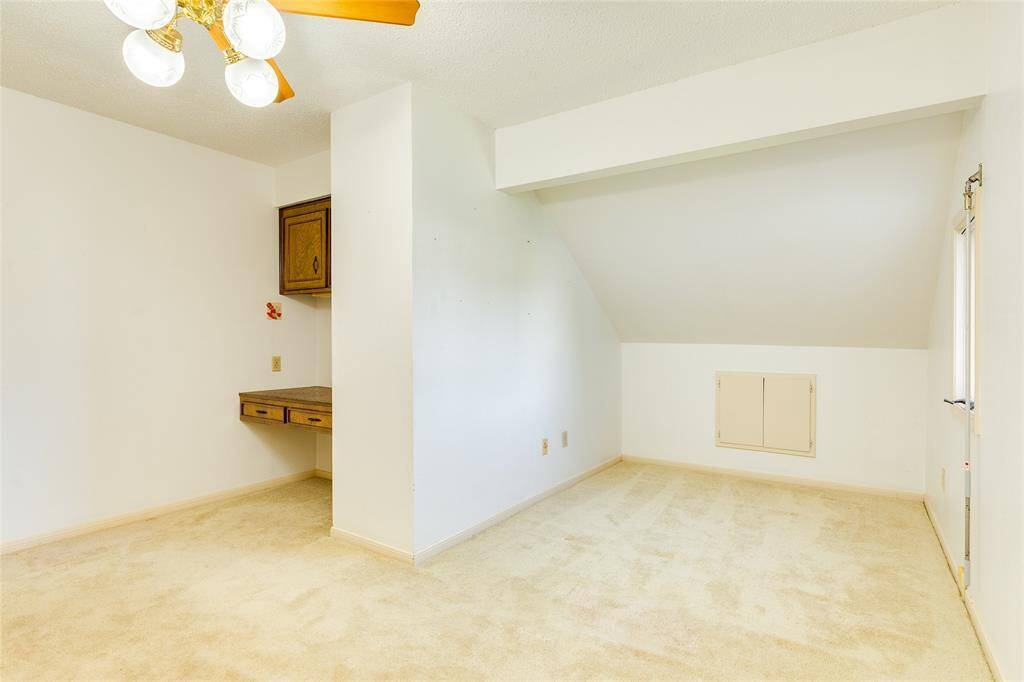 2nd floor back bedroom with waterfront views.