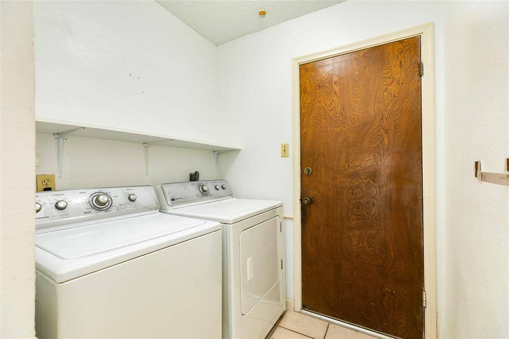 Interior Laundry area with 2 car garage entrance.