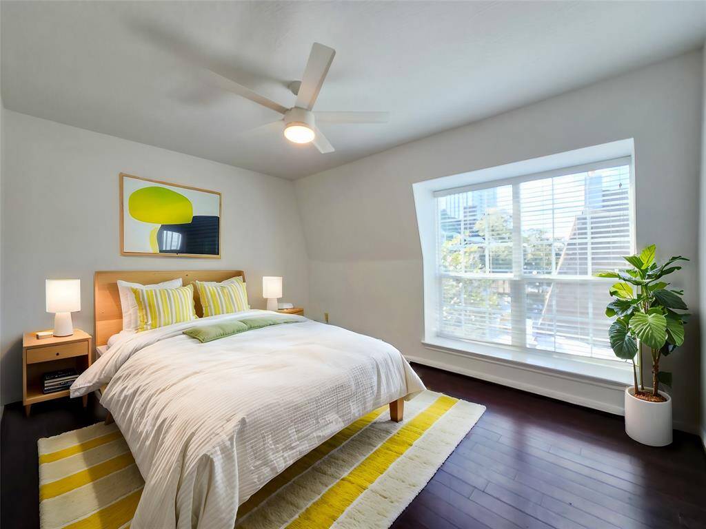 Bathed in natural light from large windows, this inviting room creates an airy atmosphere, enhancing the overall sense of warmth and tranquility. Whether you envision it as a cozy guest retreat, a productive home office, or a peaceful personal haven, this beautifully illuminated space is ready to cater to all your needs. [virtually staged]
