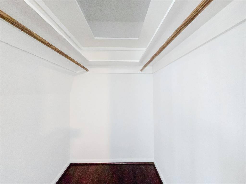 Spacious walk-in closet that offers ample storage, making organization a breeze.