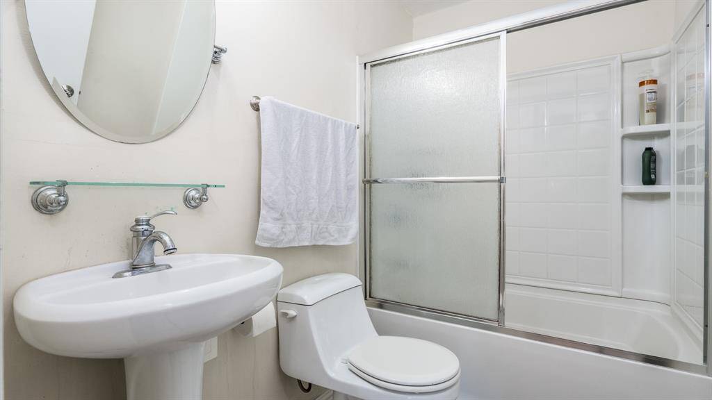 Bath #1 with tub/shower combo.