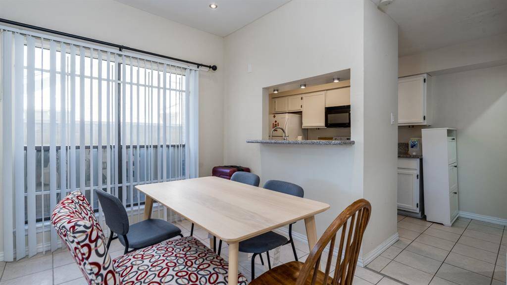 Dining area fits rather large table.