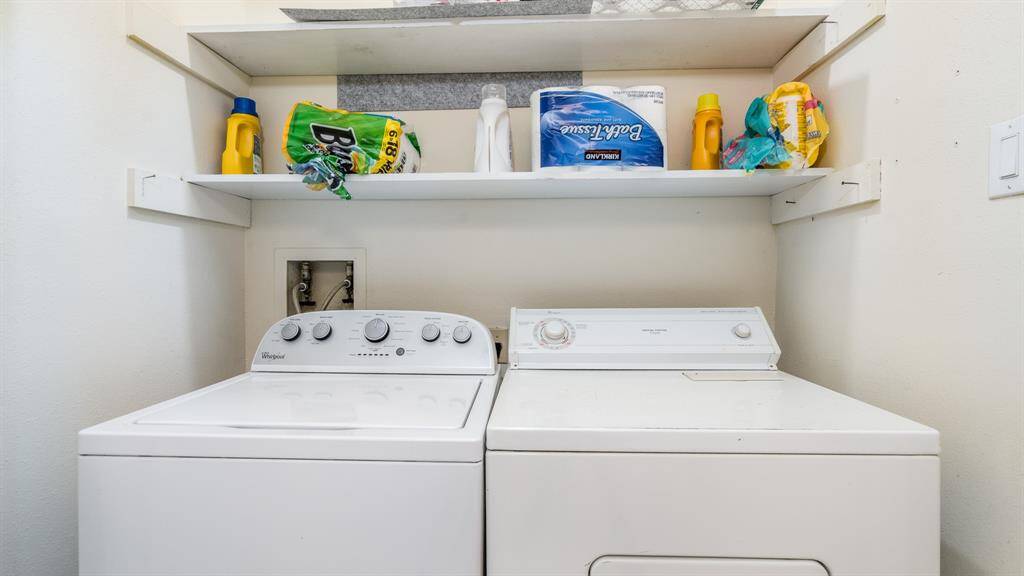Indoor laundry room off of kitchen. Washer & Dryer stay!