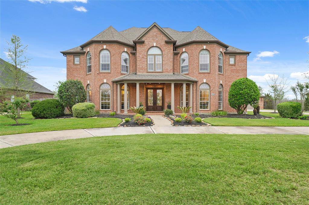 Five Bedrooms, 5.5 Bathrooms! Whole House Generator. New Wood Flooring, Interior Paint, Remodeled Kitchen, Designer Fixtures and MORE!