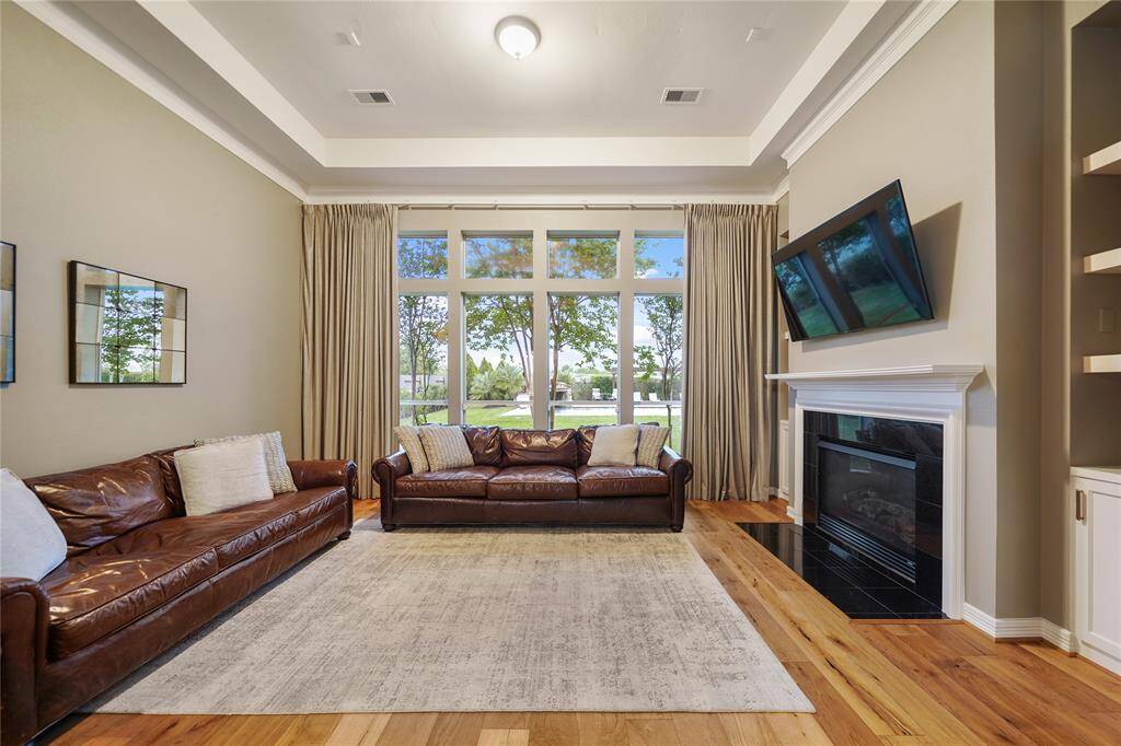 Beautiful cozy fireplace to create an inviting ambiance in the Primary Suite Sitting Area!