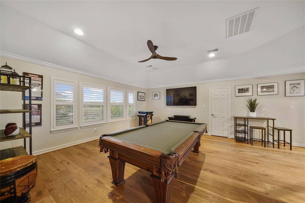 Game Room, Wood Flooring, fresh Paint, Plantation Shutters, & ample lighting