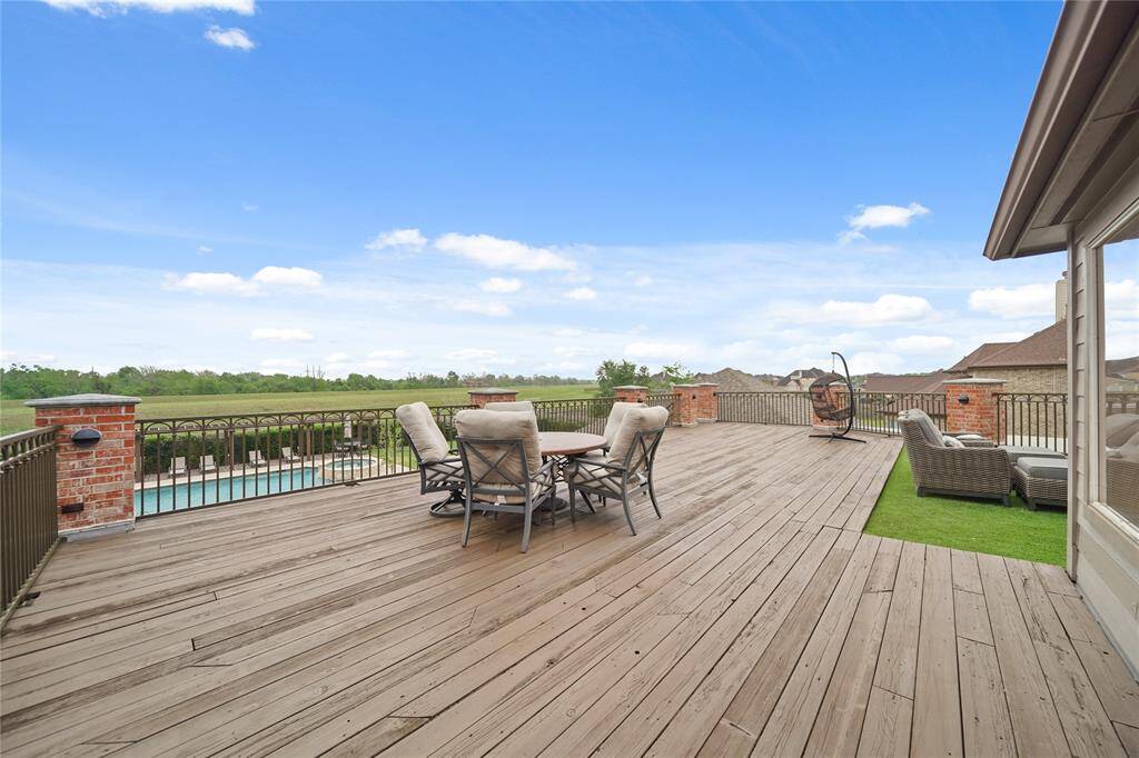Huge second floor deck, Freshly stained, and turf on the lounge section for relaxing and watching your favorite game or movie.