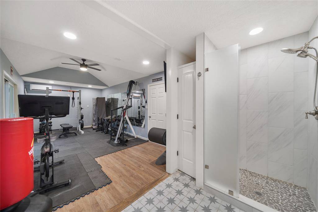 A home gym equipped with a full bath (air and heat included).