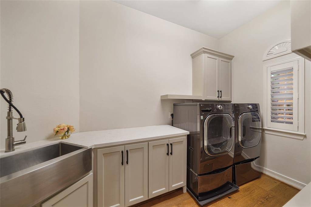 Grand Utility Room, Complete with sink, Folding Counter and lots of storage space