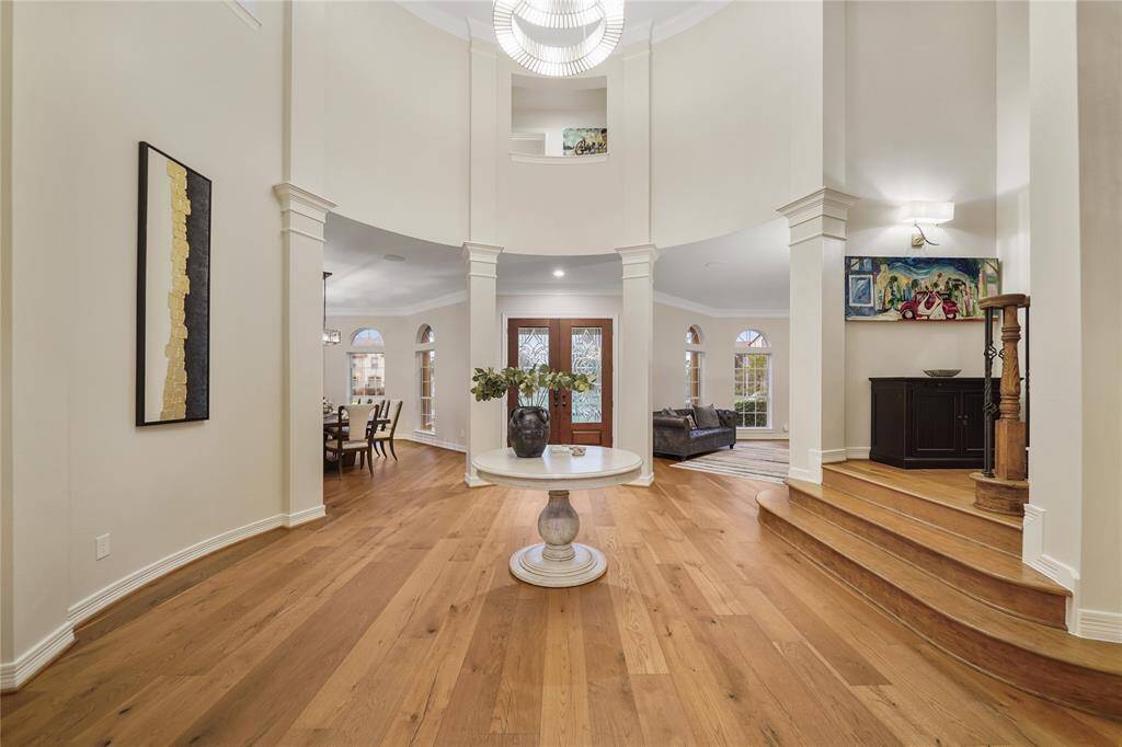 Great View of the Formal Entry. Showing the Dining Room, Formal Living Room and a few steps up to the Private Study.