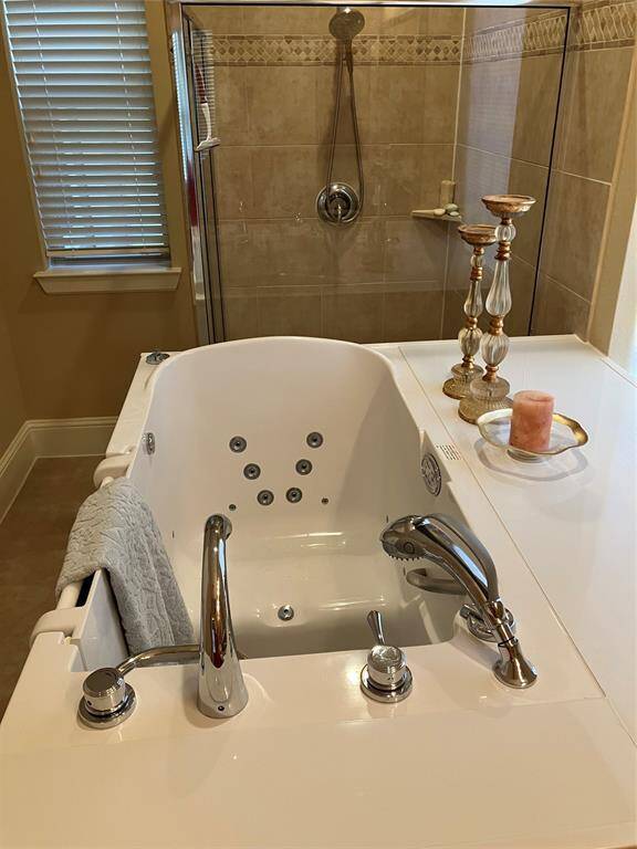 Imagine luxuriating in this deep jetted tub