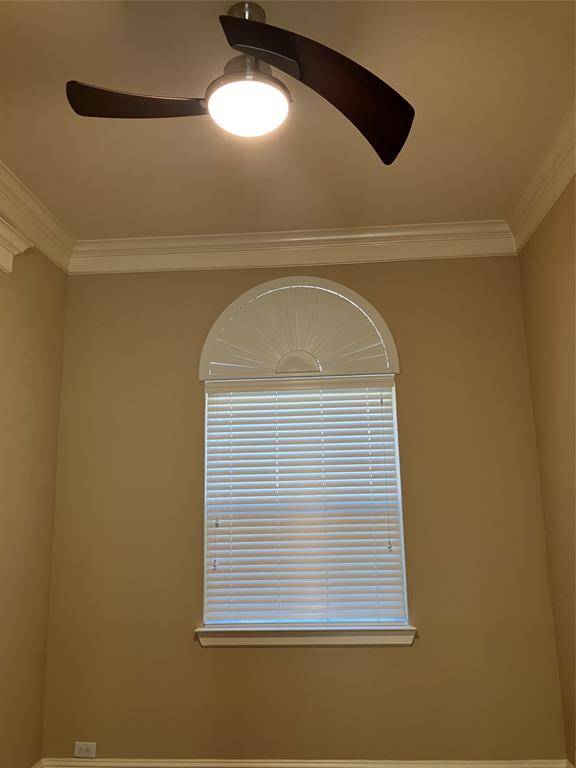 Dining room, or multi-use space. Note cool fan.