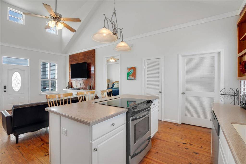 The left door leads to the pantry, and the right door leads to your utility room with full size washer and dryer.