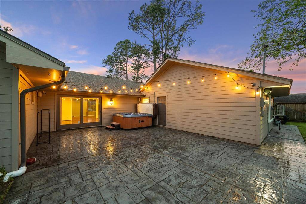 LED string lights and Polk audio patio speakers.