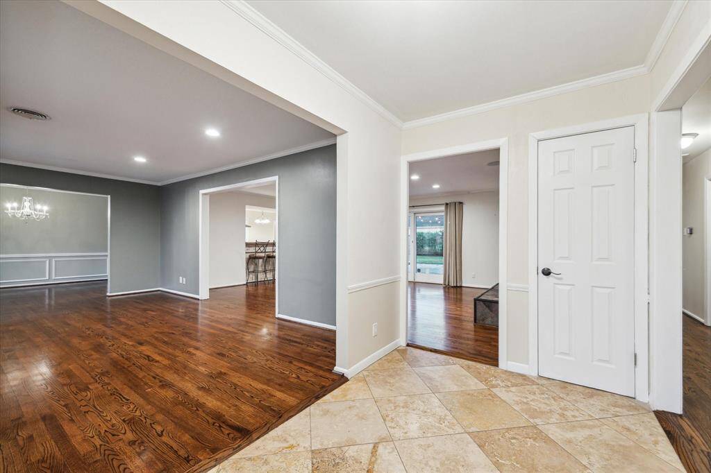 Freshly painted '25 and well-kept Travertine & hardwoods throughout.
