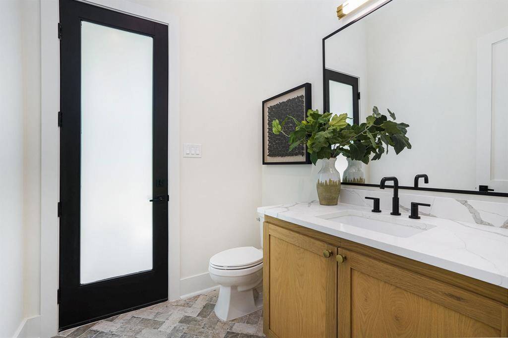 Powder room with exterior access.