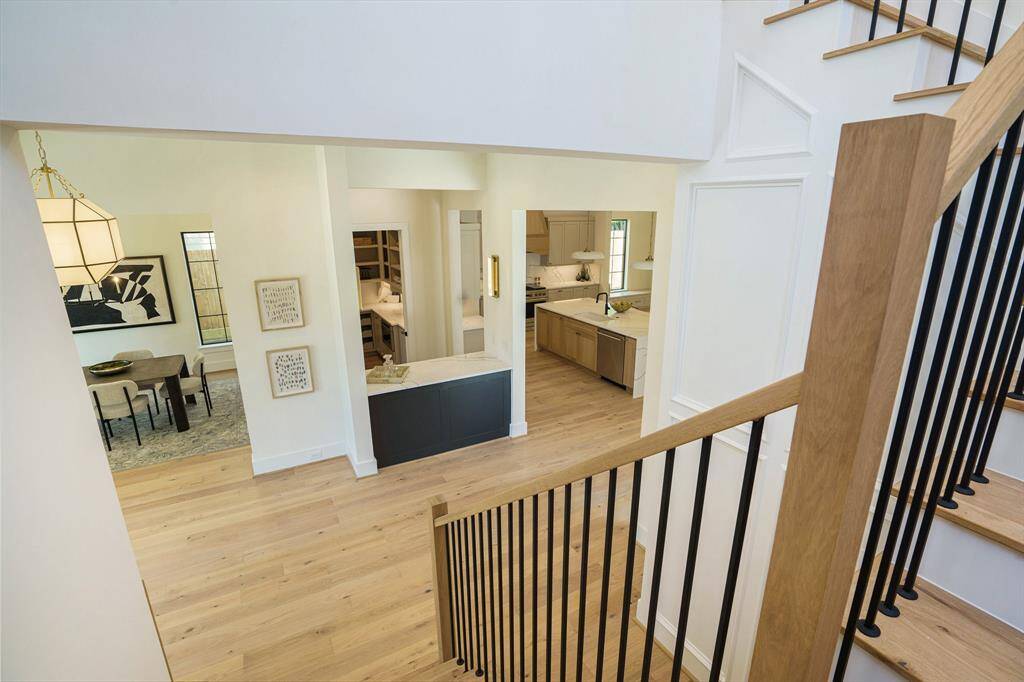 Custom railings combining wood and rod iron.