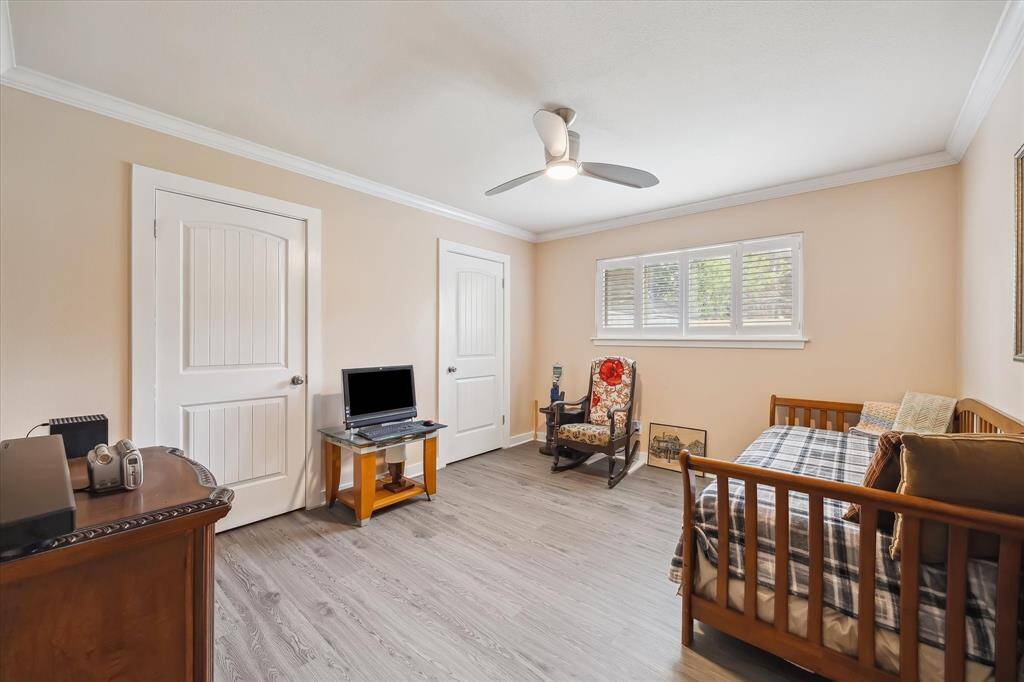 The second bedroom offers great flexibility for guests, hobbies, or a second home office setup.