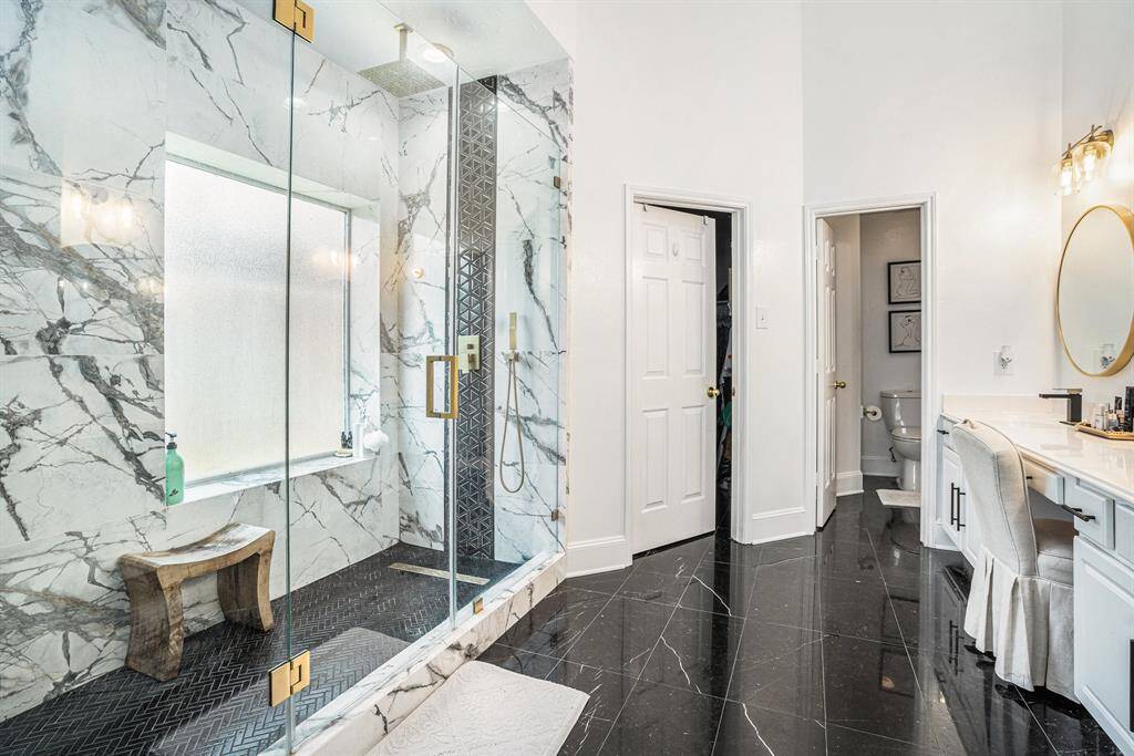 Double shower heads located on each end of shower.