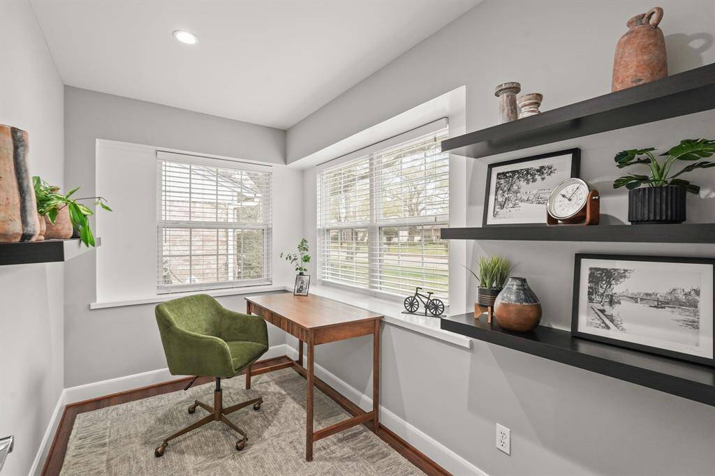 The light & bright Home Office is ideal for working from home or creating a quiet, productive environment. With the custom shelving, room is both a practical & visually appealing space.