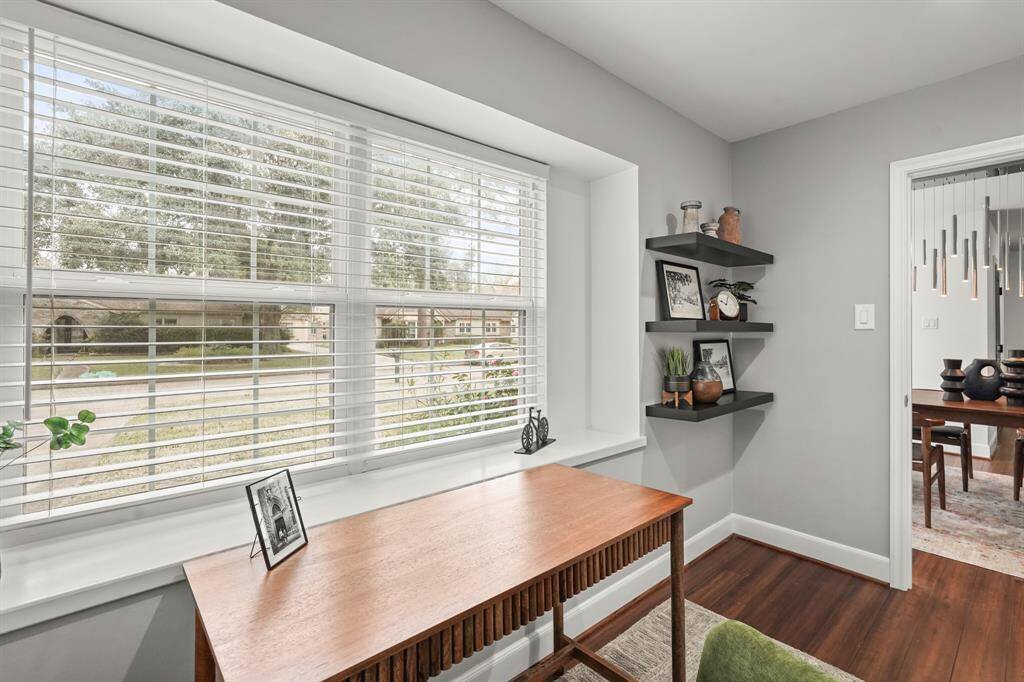 The Home Office offers lovely views of the outdoors & is the perfect space for working, studying, or simply enjoying a quiet retreat or can be used as a flex room.