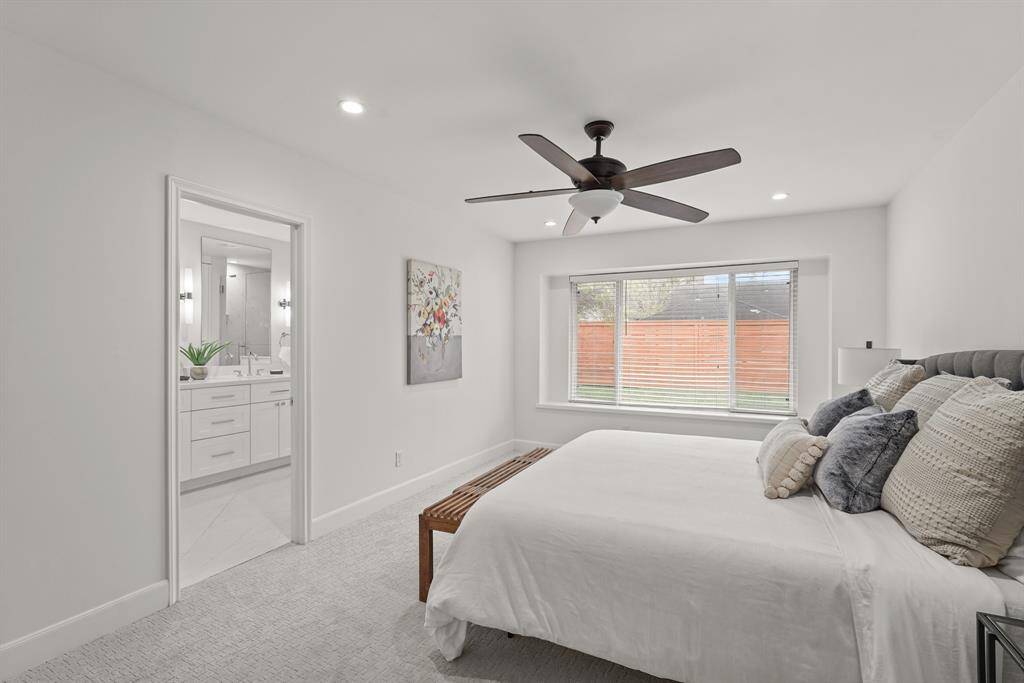 This beautifully updated Primary Suite features a large, comfortable layout, new carpet & plenty of natural light.