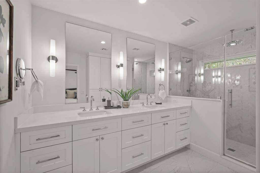 The Primary En Suite Bathroom has been completely updated to offer both luxury & convenience.