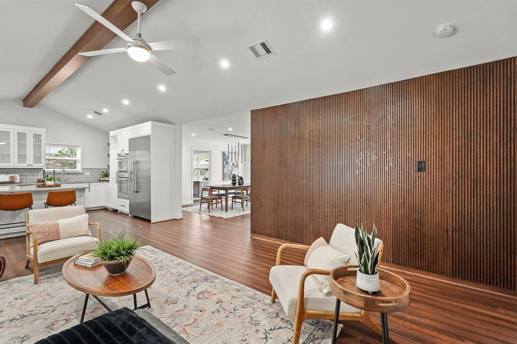 Both the Family Room & Kitchen flow effortlessly into the Formal Dining Room, making this space ideal for gatherings & everyday living.